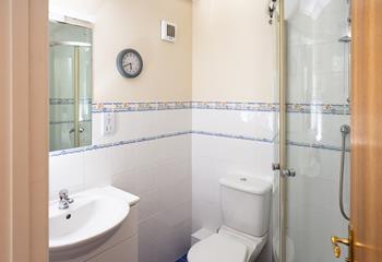 Start your day with an invigorating shower before heading to the beach.