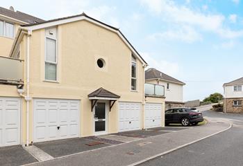 Sandy Bay comes with garage storage for beach gear and a private parking space.