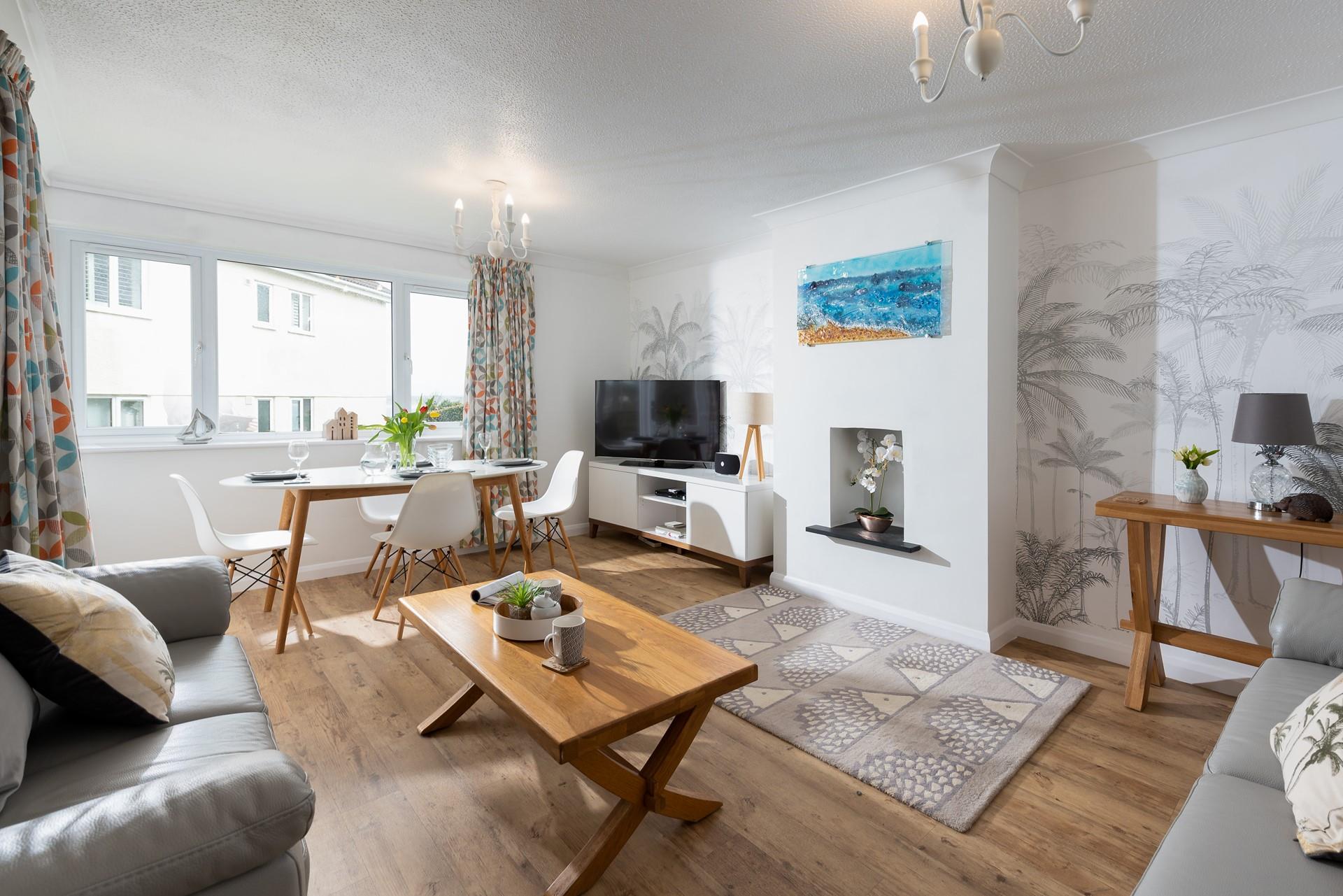 Bright and colourful, this uniquely designed living room features a fabulous mix of designs and patterns. 
