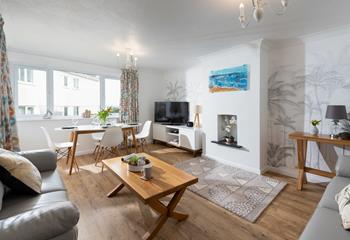 Bright and colourful, this uniquely designed living room features a fabulous mix of designs and patterns. 