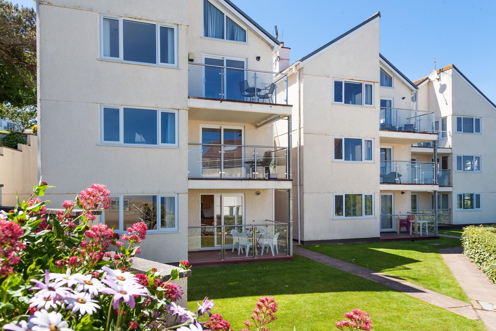 Spend lazy mornings sunbathing on your balcony sipping iced coffee.