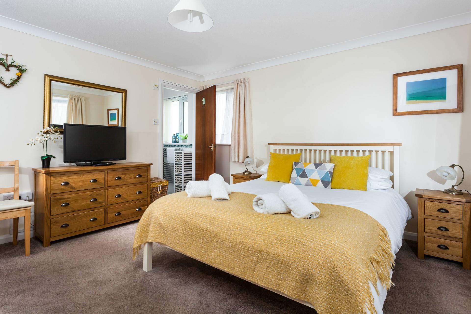 Warm and inviting, you're sure to have a restful; night's sleep in bedroom 1. 