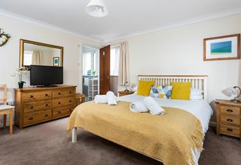 Warm and inviting, you're sure to have a restful; night's sleep in bedroom 1. 