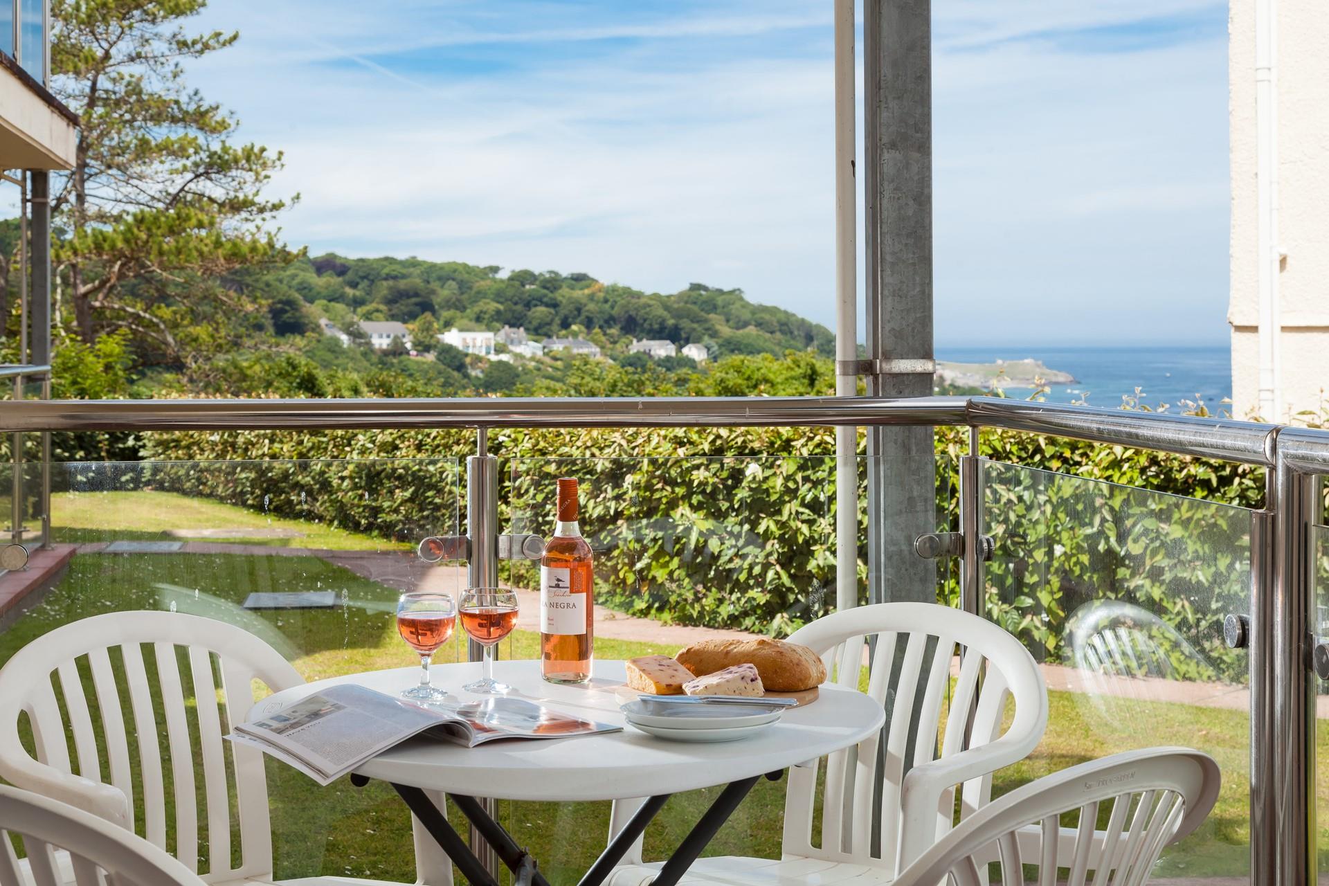 Unwind in the evenings with a glass of wine and watch the sunset over the Bay.