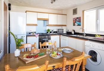 The kitchen has everything you need for your stay at Sea Fever. 