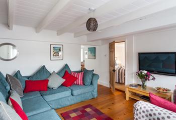 The colourful sitting room is the perfect base to come back to each day.