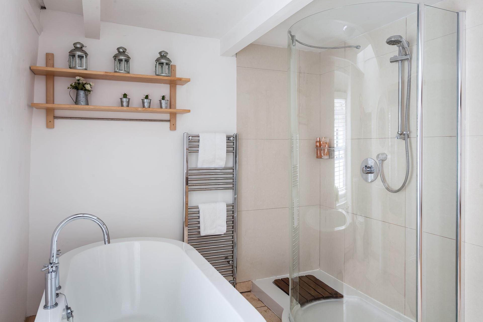 Sink into a sumptuous bath, or wash away any stresses and strains in the large walk-in shower. 