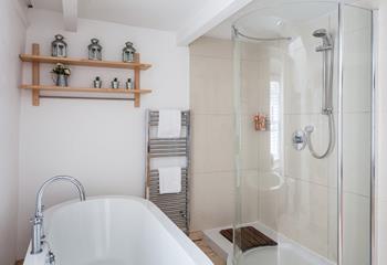 Sink into a sumptuous bath, or wash away any stresses and strains in the large walk-in shower. 
