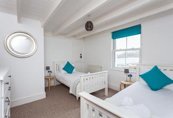 Bedroom 2 boasts views across the harbour. 
