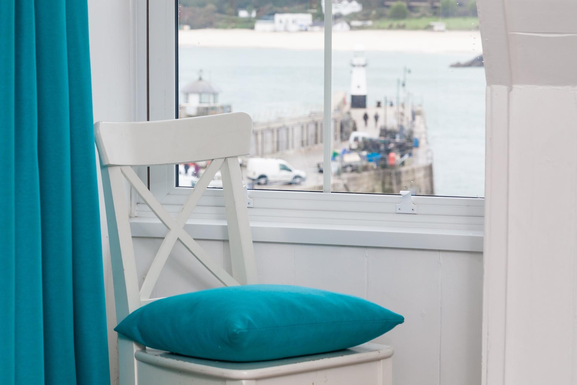 While away the hours watching the comings and goings of the harbour. 