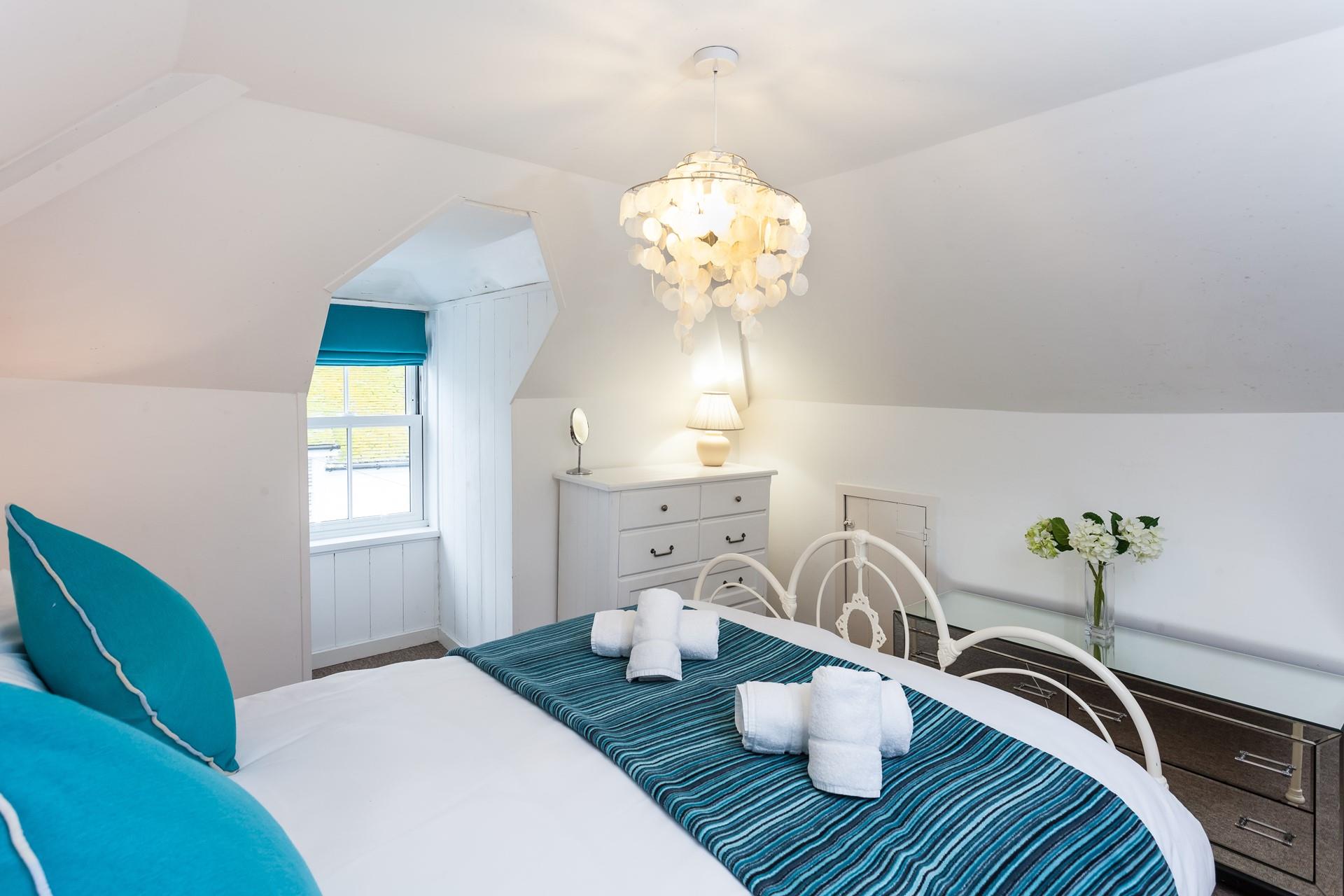 Sink into the sumptuous bed and enjoy a blissful night's sleep. 