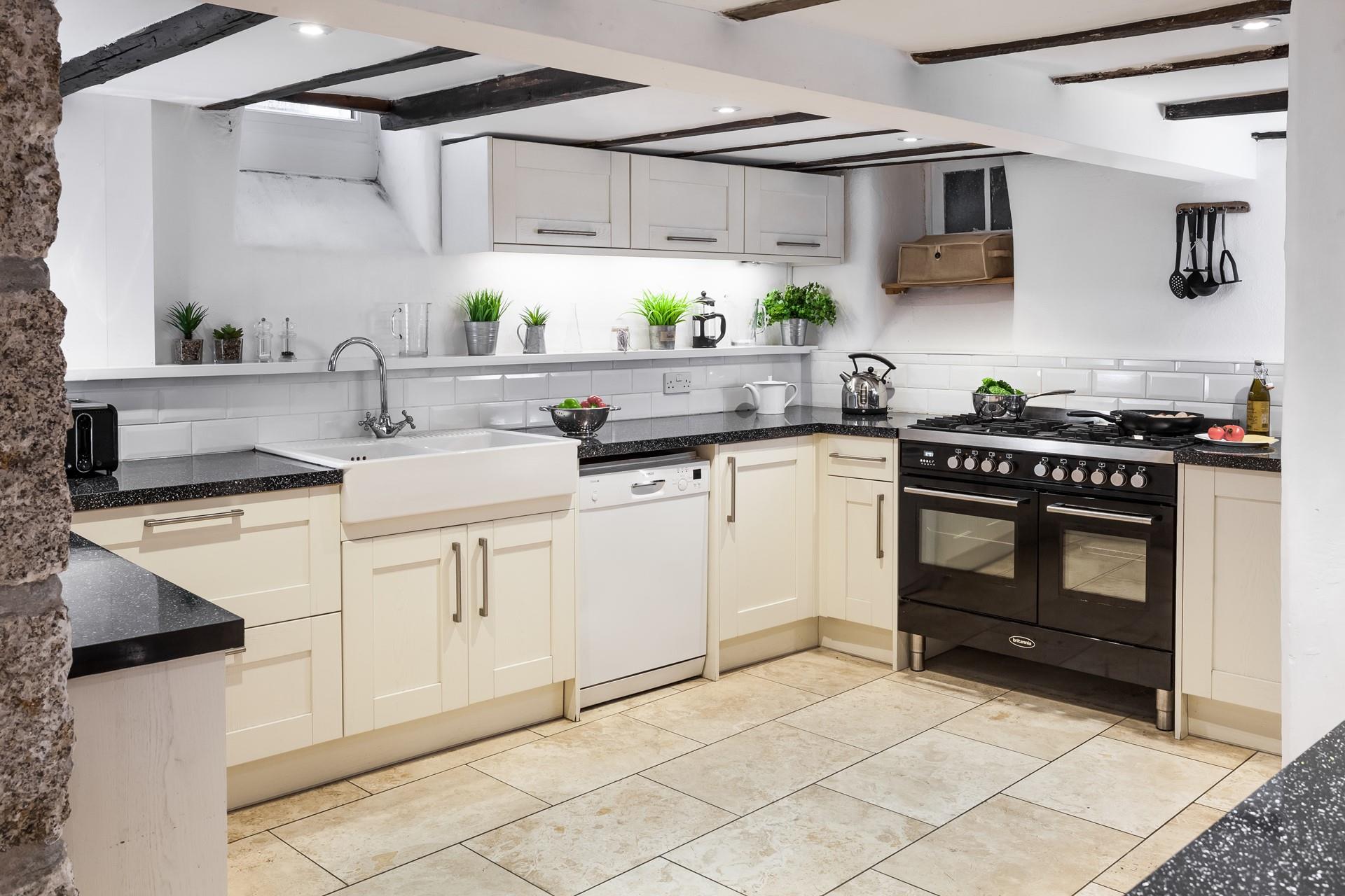 Head down to the basement and you'll be amazed by the stunning kitchen and dining area.