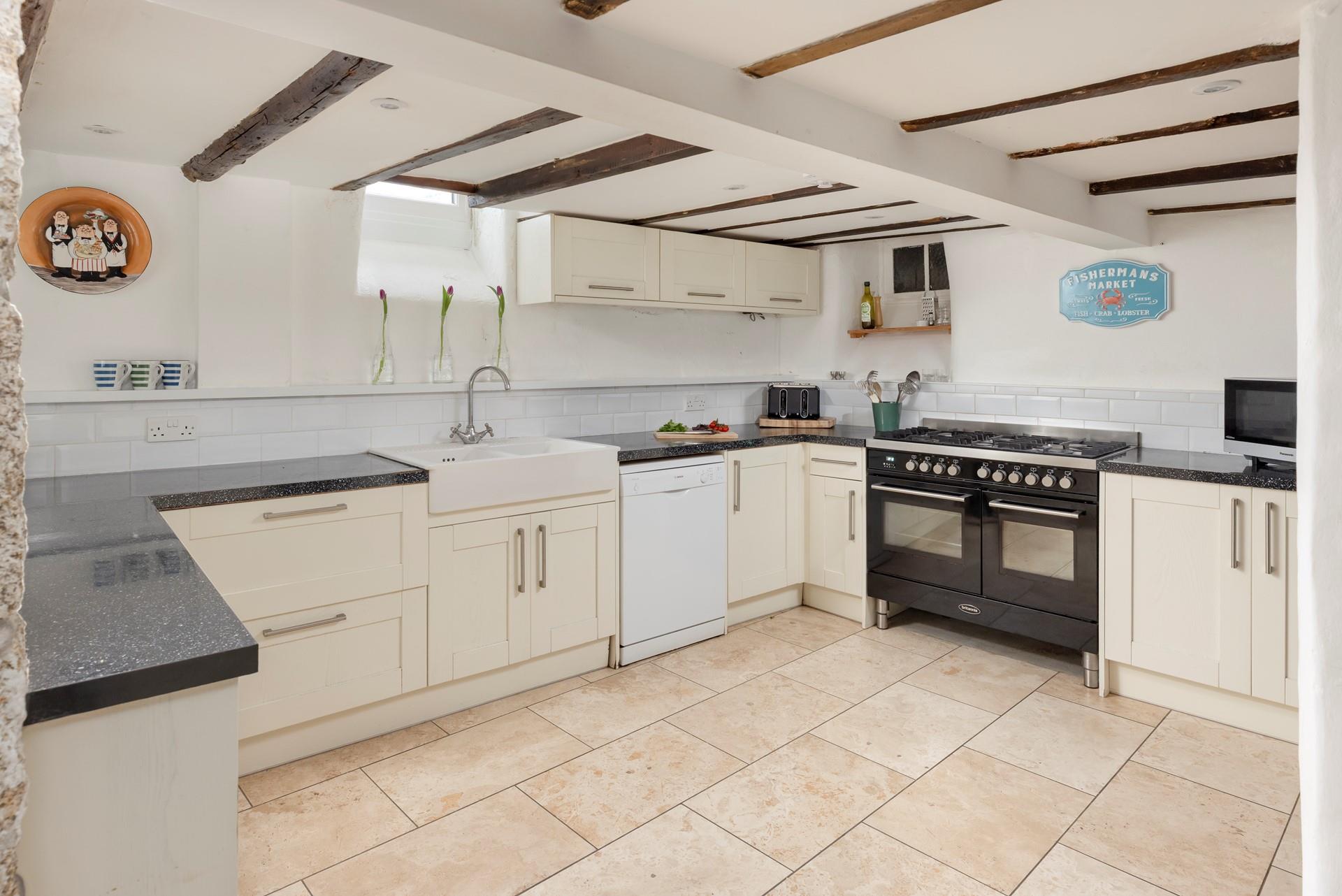 The kitchen is perfectly equipped for cooking delicious meals.