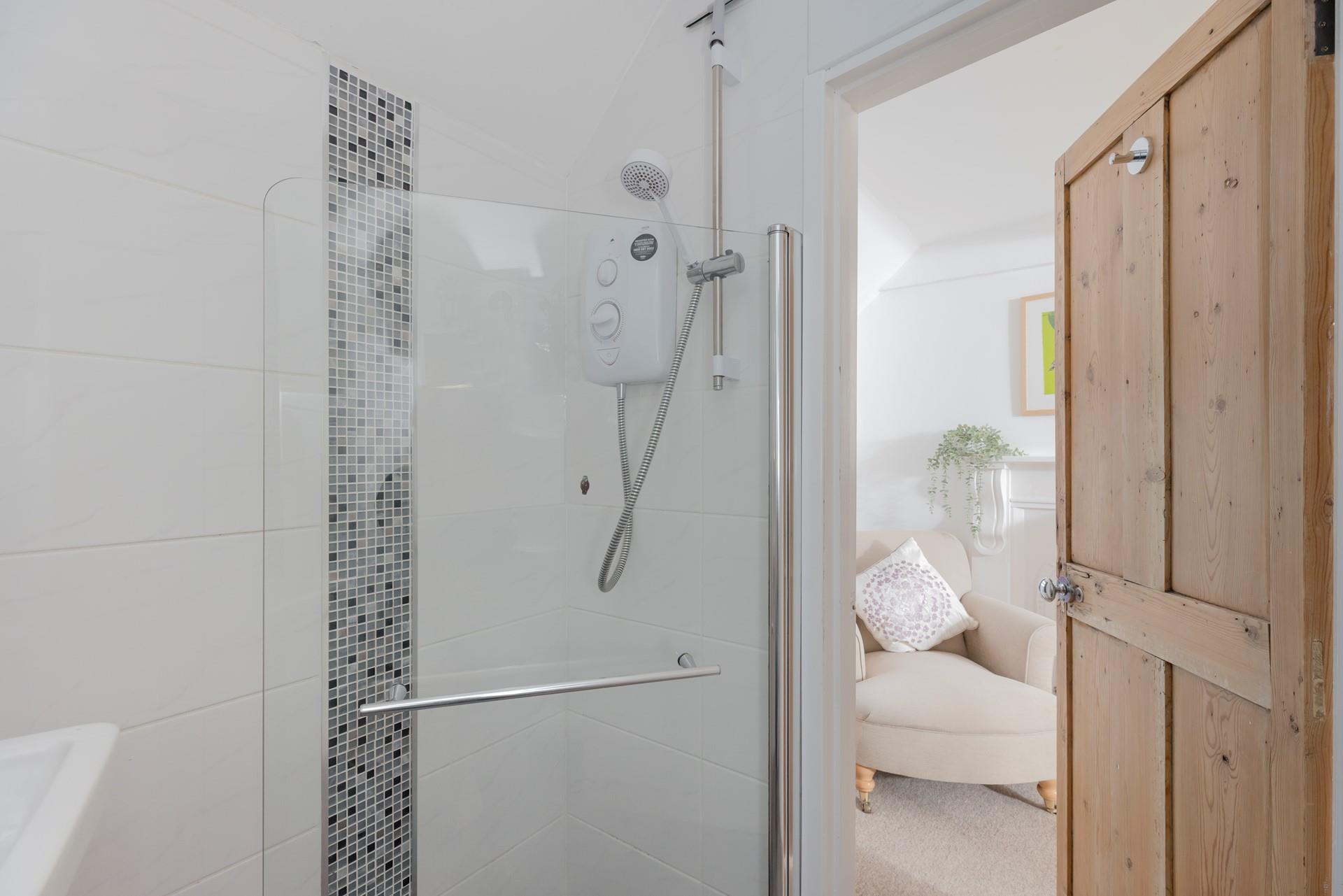 Wash the day away in the en suite shower room.