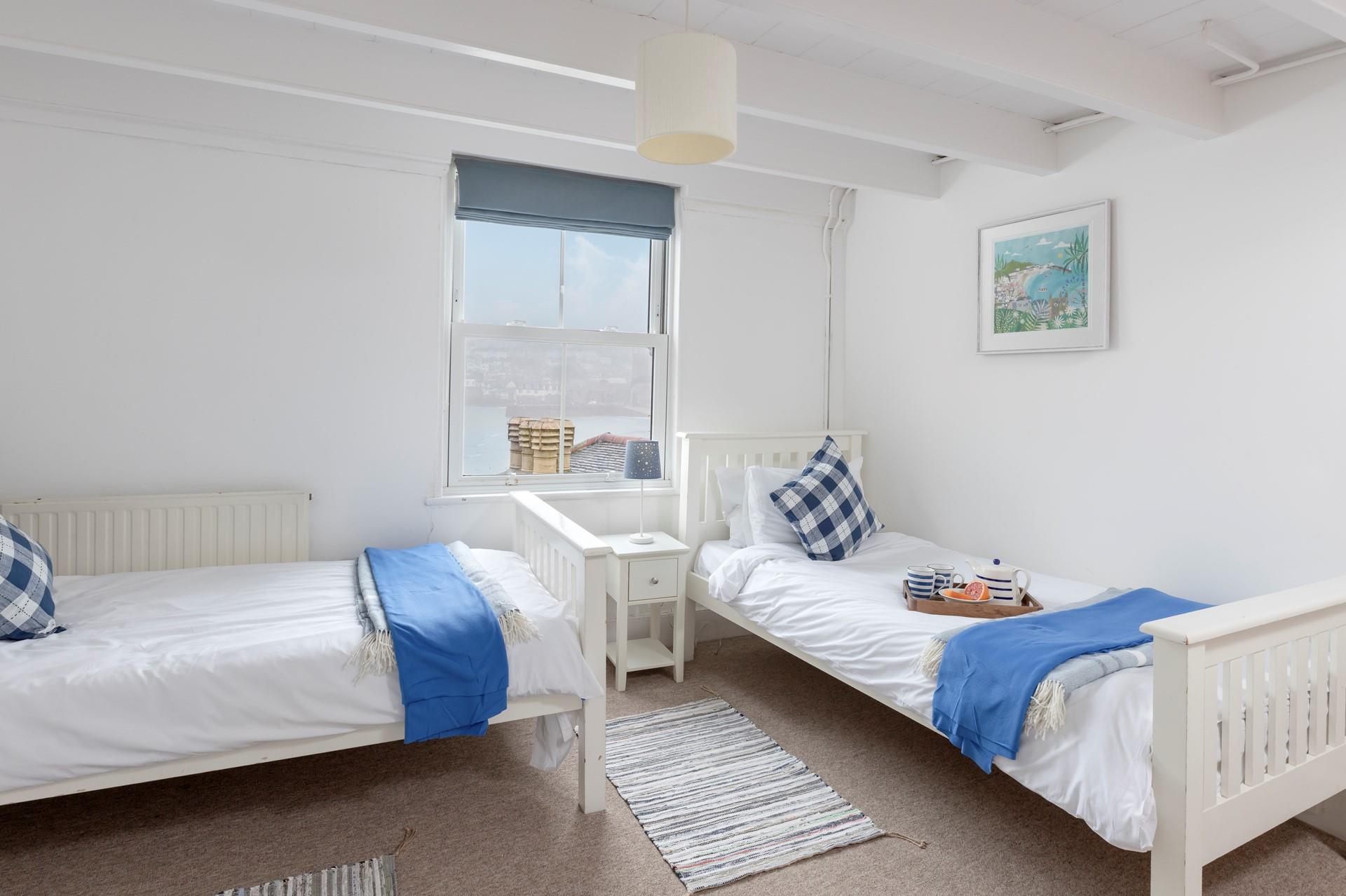 The twin beds are ideal for children or adults to enjoy a relaxing slumber.