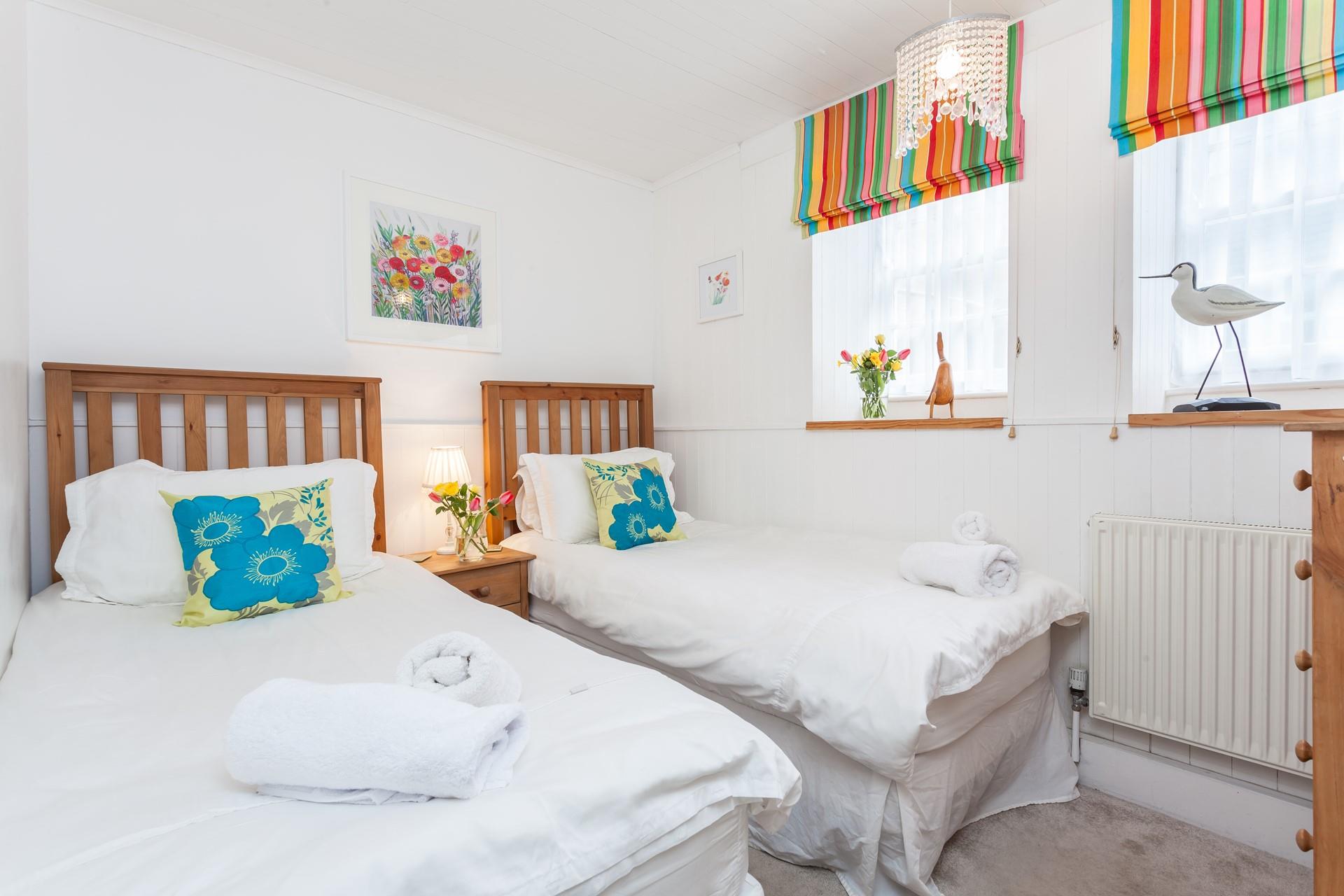 Settle the kids into the twin beds and then open a bottle of wine to sip in your sitting room.