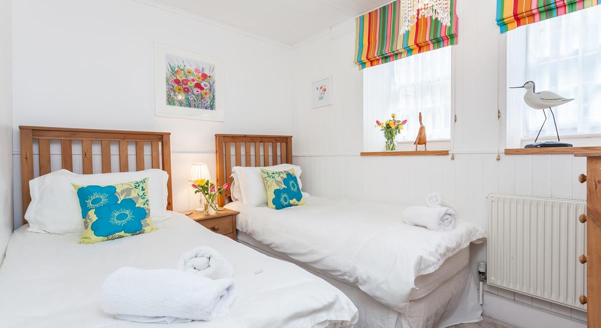 Settle the kids into the twin beds and then open a bottle of wine to sip in your sitting room.