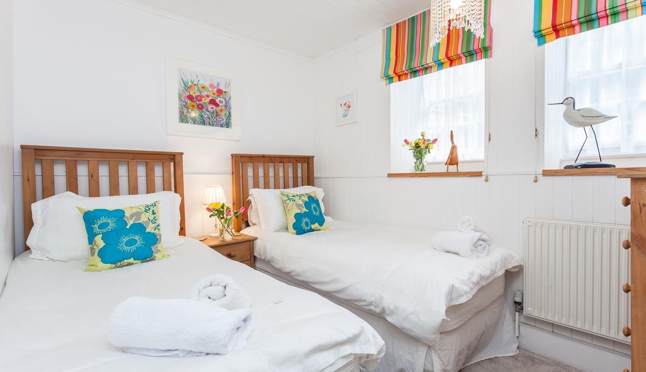 Settle the kids into the twin beds and then open a bottle of wine to sip in your sitting room.