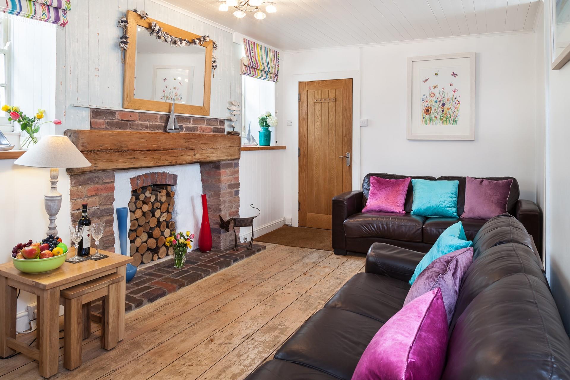 Curl up on the sofa after watching the sun go down on the beach.