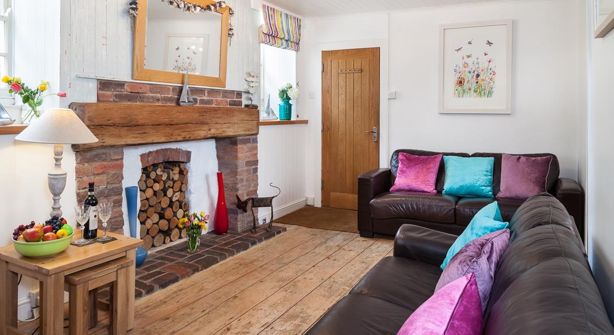 Curl up on the sofa after watching the sun go down on the beach.