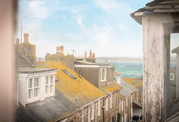 Enjoy gazing out over the iconic St Ives rooftops, to the sea glistening in the distance.