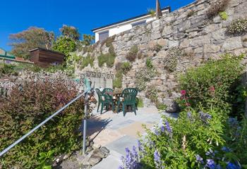 The stunning garden is perfect for soaking up the afternoon sunshine whilst dining al fresco. 