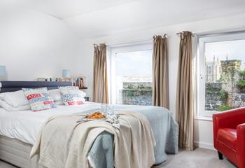 Step out of bed and throw open the curtains to enjoy the sea views.