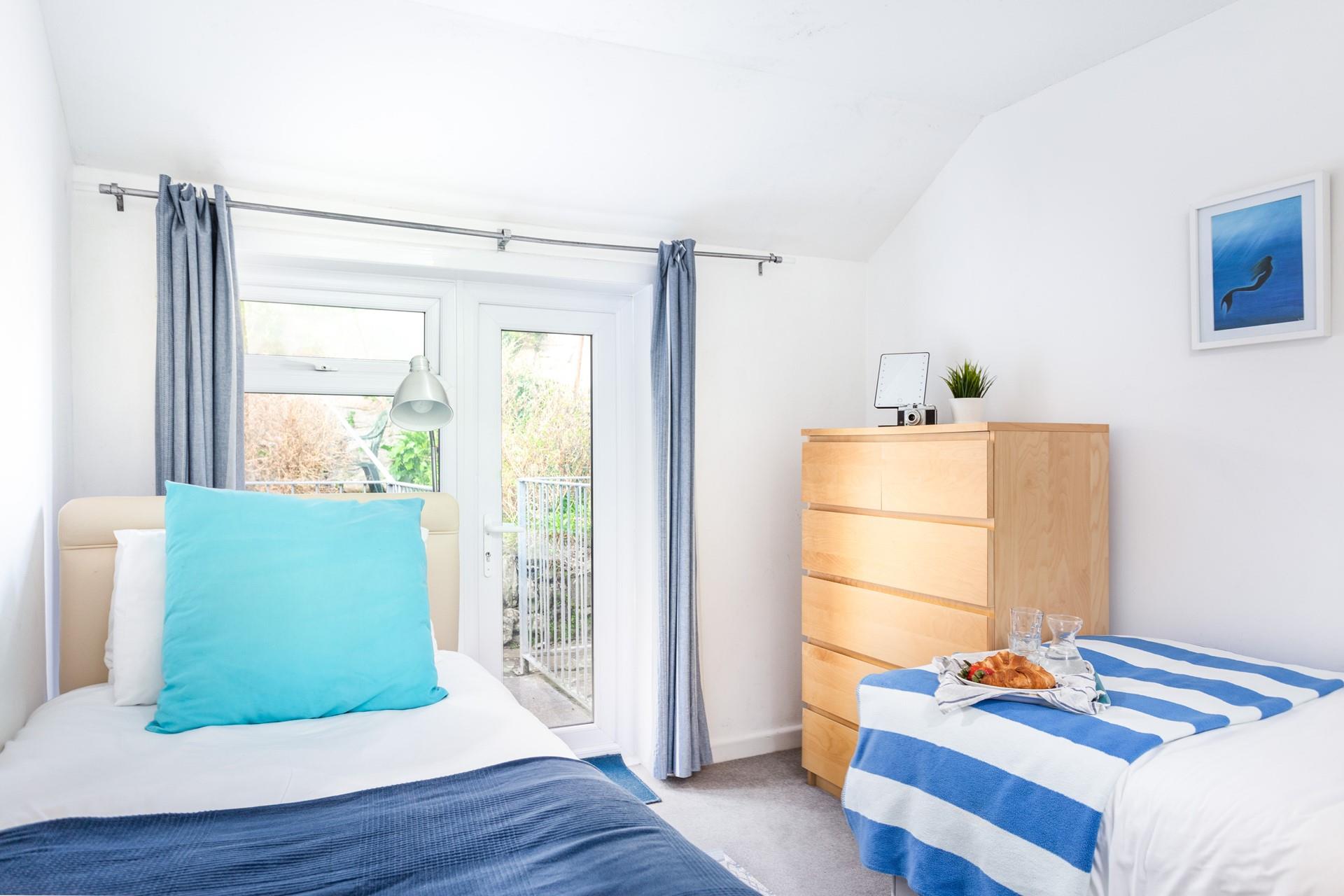 The twin room is perfect for both children and adults and benefits from a door to the outside area.