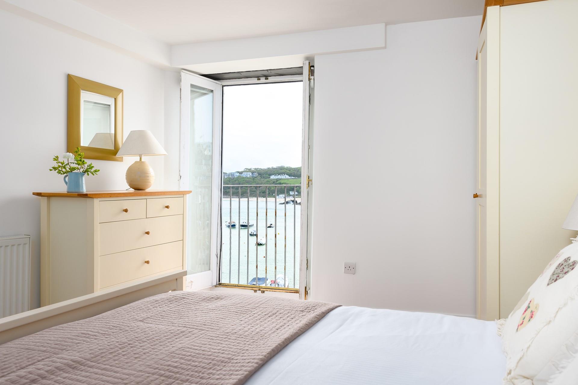 Relax in bed watching the sunset on another day.