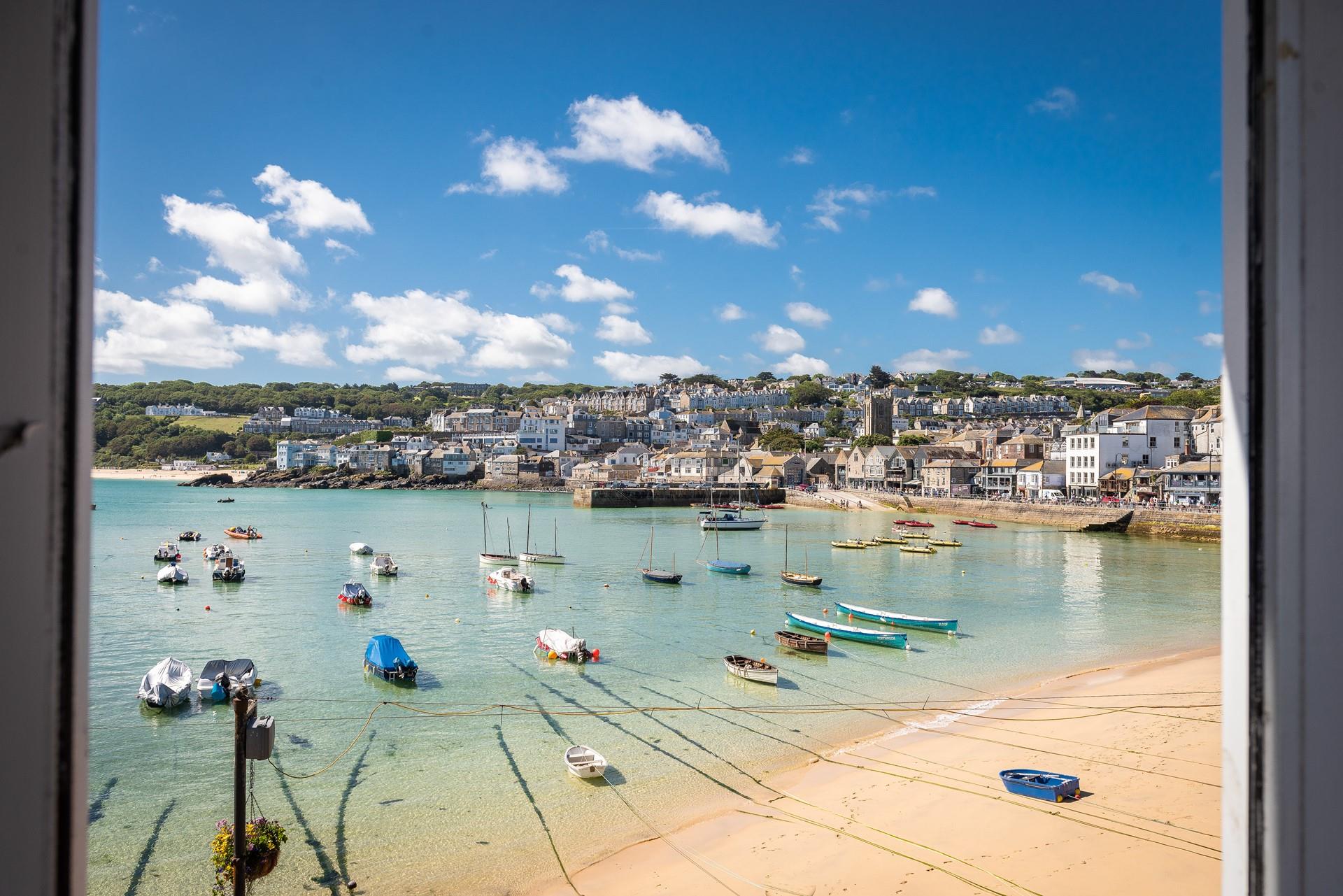 Watch the boats bobbing in the harbour while you sip your morning cuppa.