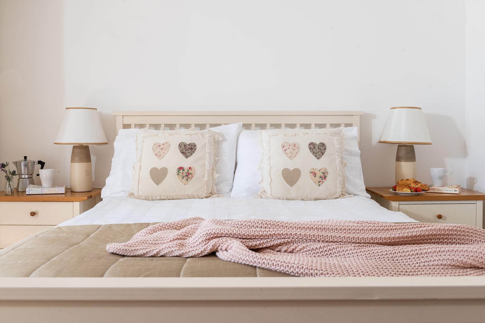 Snuggle into bed for a cosy night's sleep after an evening walk across the beach.