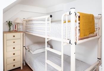 Bedroom 2 has bunk beds for the kids to drift off to sleep.