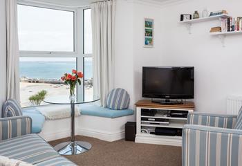 The comfortable sitting room offers breathtaking views across St Ives.