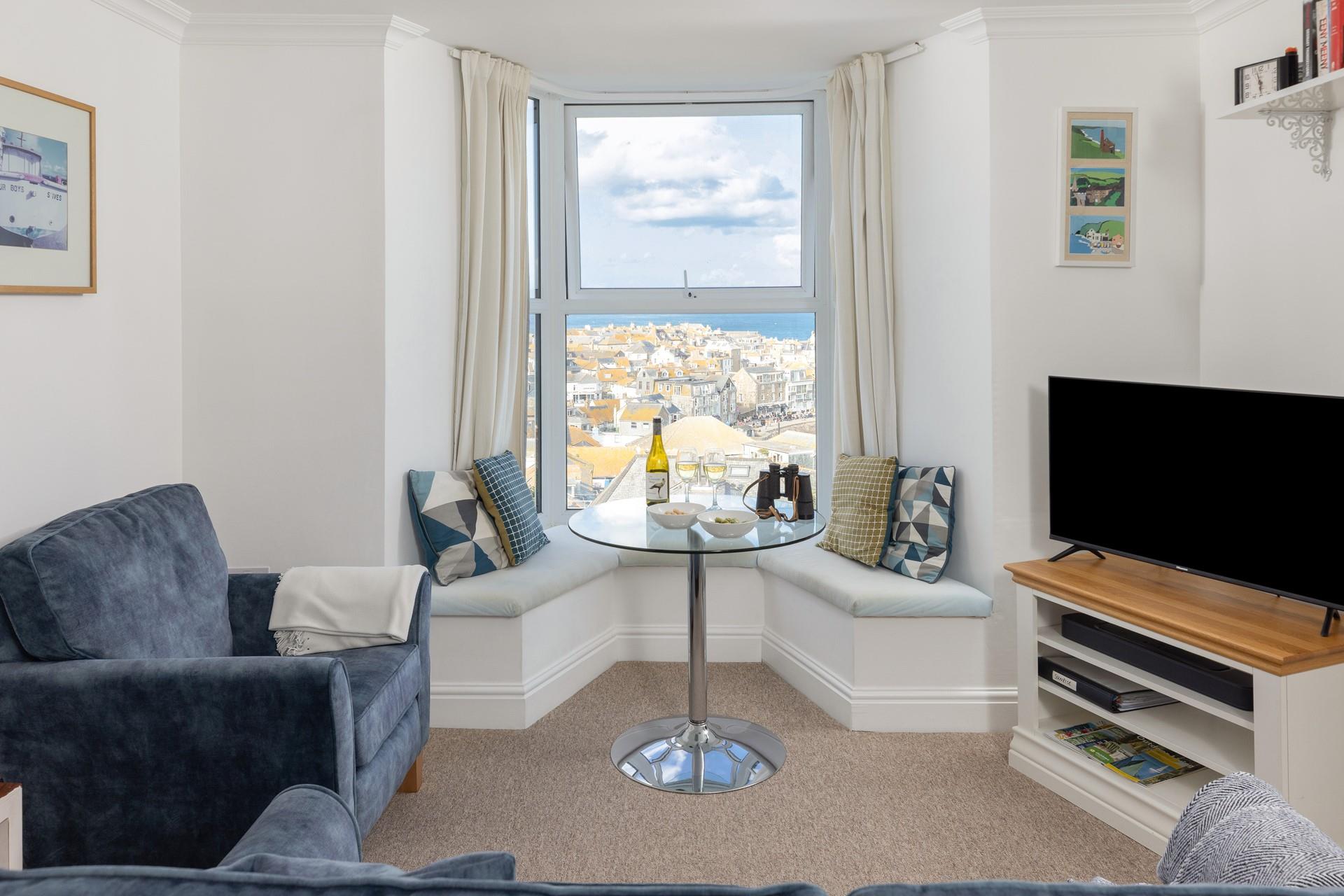 The dining table is perfectly positioned to allow you to enjoy the sea views whilst you eat.