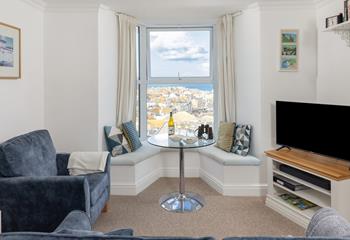 The dining table is perfectly positioned to allow you to enjoy the sea views whilst you eat.