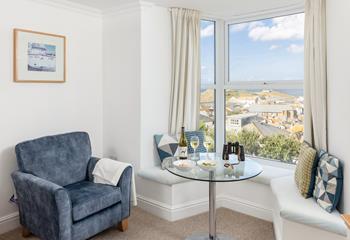 The comfortable sitting room offers breathtaking views across St Ives.