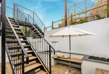 Climb the stairs to the raised seating area to take in the sea views.