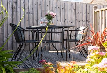 Tuck into a breakfast of fresh pastries on the suntrap decking.