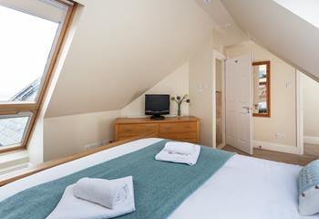 Bedroom 1 benefits from an ensuite, giving guests extra space and privacy to get ready.