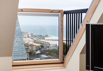 The Cabrio Velux windows open to form a balcony.