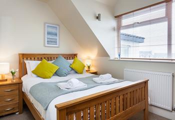 Bedroom 3 has a double bed and classic furniture that has created a homely feel.