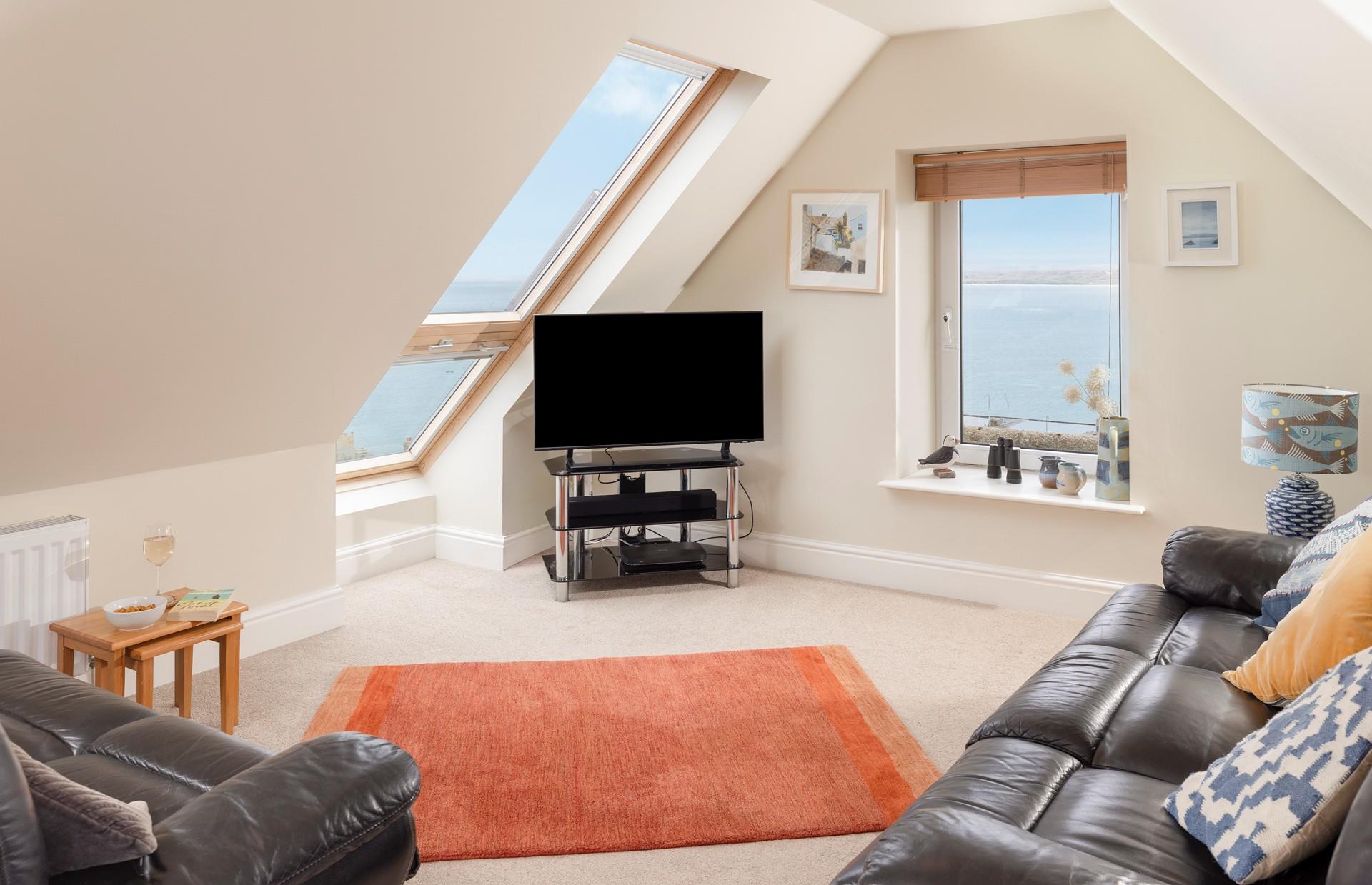 Put your feet up and enjoy the views in the light-filled lounge.