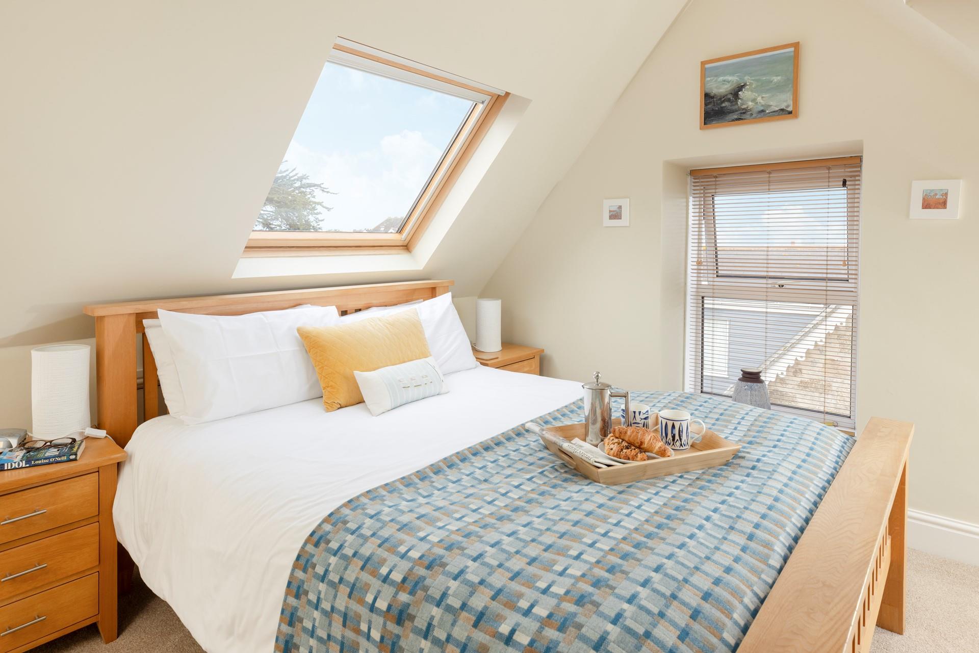 Bedroom 1 benefits from a king size bed, ensuring a comfortable night's sleep.