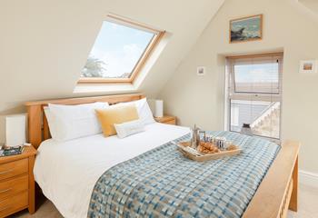 Bedroom 1 benefits from a king size bed, ensuring a comfortable night's sleep.