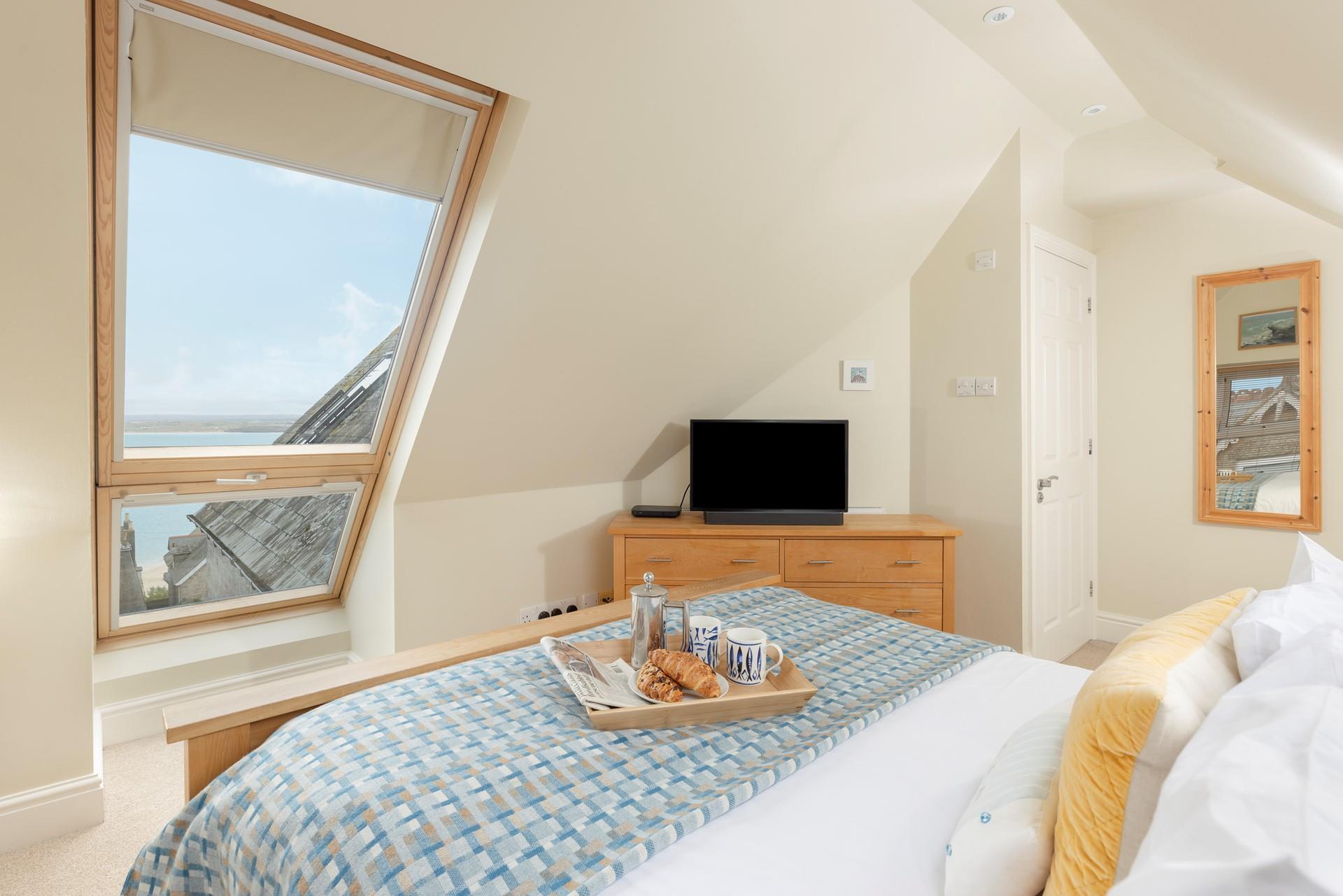 The view through the rooftop stretches across miles of beautiful blue sea.