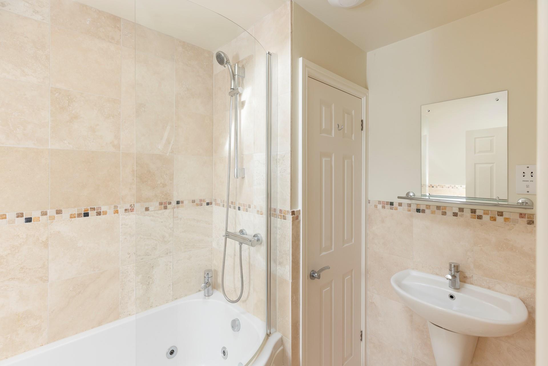 Relax in the luxurious whirlpool bath at the end of a fun-filled day.