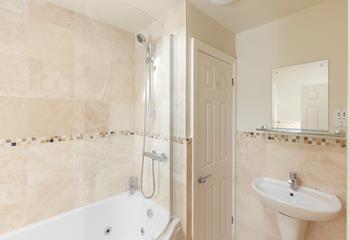 Relax in the luxurious whirlpool bath at the end of a fun-filled day.