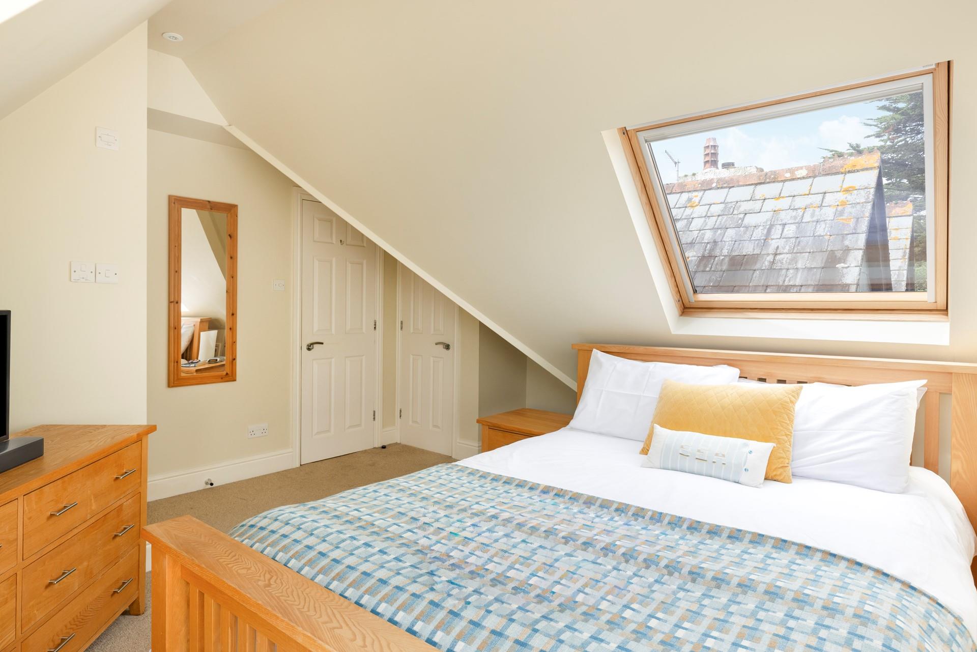 Return home from a day at the beach, knowing this dreamy room awaits you.