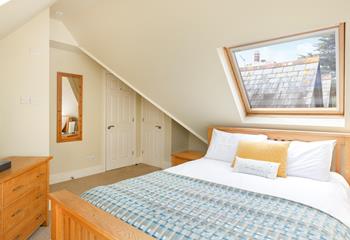 Return home from a day at the beach, knowing this dreamy room awaits you.