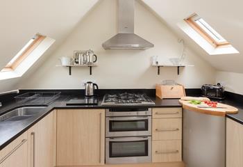 Cook up delicious meals for your loved ones in the modern kitchen.